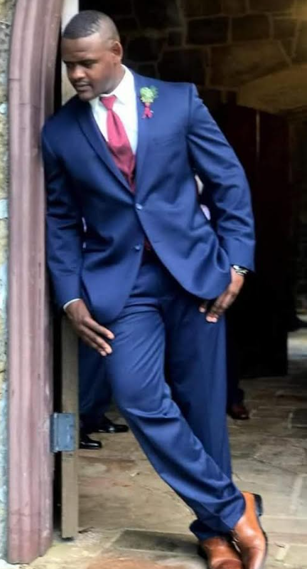 AJ in a blue suit